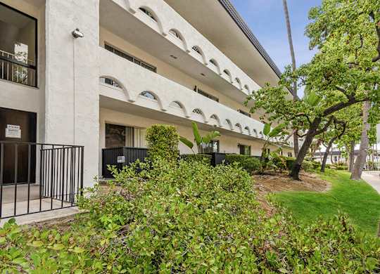 Exterior Community Building at Palmilla Apartments located in San Diego, CA.