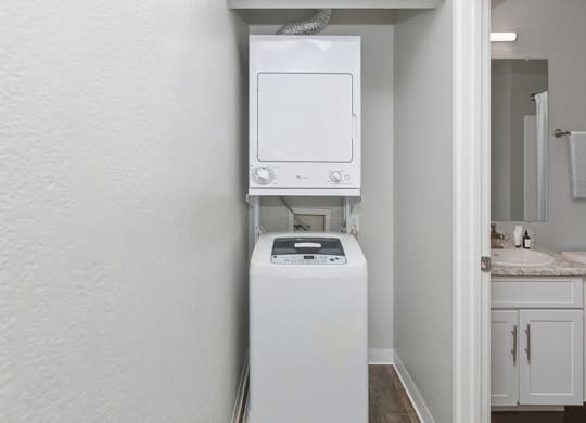 Model Unit Stackable Washer and Dryer Hook Up at The Meritage Apartments in Vallejo, CA.