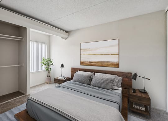 Model Bedroom with Carpet, Closet & Window View at Mason Van Dorn Apartments located in Alexandria, VA.