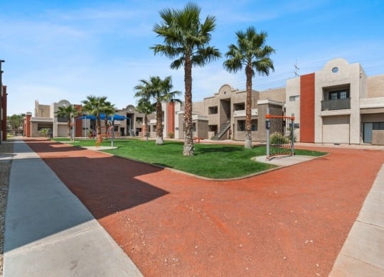 Property exterior showcasing well kept landscape and walking paths