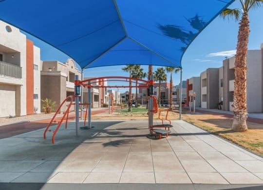 Community playground with sun cover