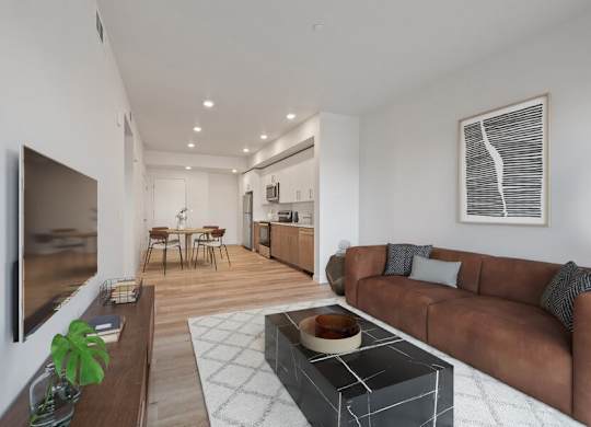 Model living room with view on kitchen and dining