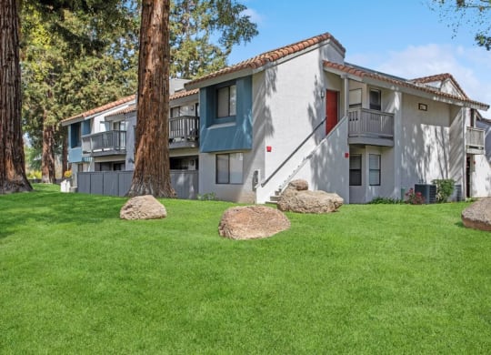 Exterior Community Building and Landscape at Creek 2645 Apartments in Sacramento, CA.