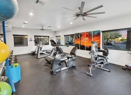 Community Fitness Center with Equipment at Ridgeline Apartments in Tucson, AZ.