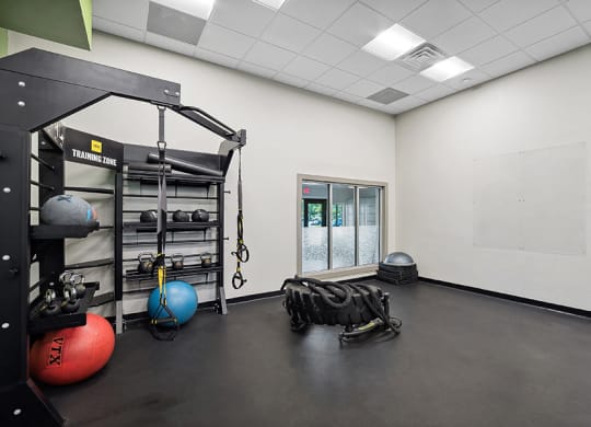 Community Fitness Center with Equipment at Rosehill Preserve Apartments in Orlando, FL.
