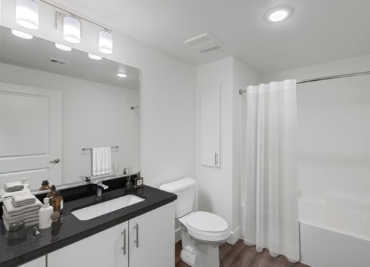 Model bathroom with modern white vanity