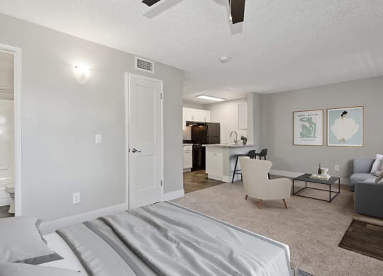 Model Studio Bedroom with Carpet at Stillwater Apartments in Glendale, AZ.