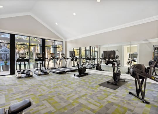 Indoor Fitness Center Treadmills and Stationary Bikes at Caribbean Breeze Apartments in Tampa, FL.