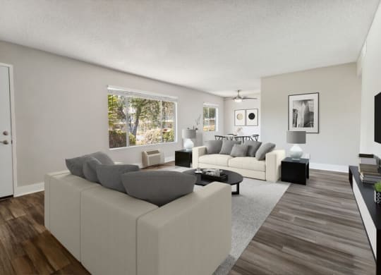 Model Living Room with Wood-Style Flooring & Window View at Forest Park Apartments in El Cajon, CA.