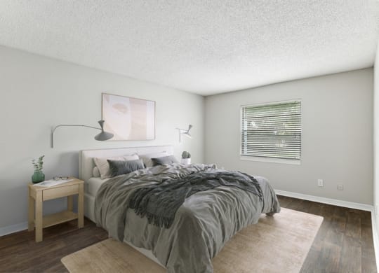 Model bedroom with queen-size bed