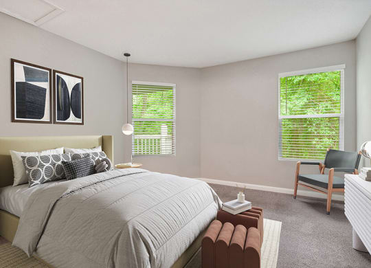 Model Bedroom with Carpet and Window View at Park 2300 Apartments in Charlotte, NC.