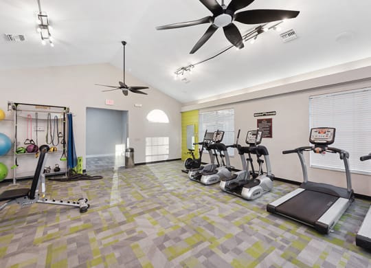 Community Fitness Center with Equipment at Vue at Baymeadows Apartments in Jacksonville, FL.