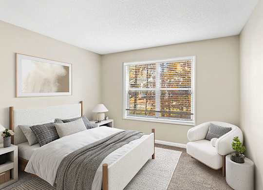 Model Bedroom with Carpet and Window View at Element 41 Apartments located in Marietta, GA.