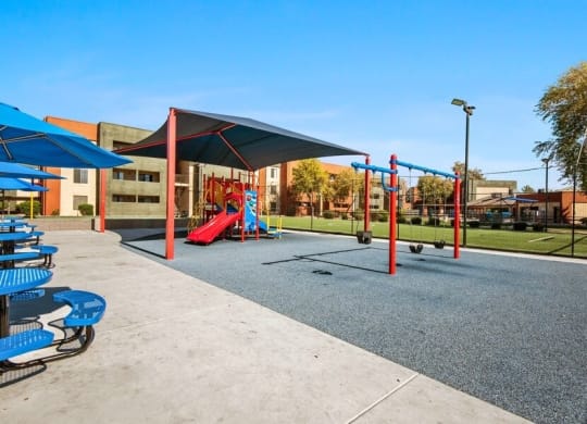 Playground with swings at Saratoga Ridge, Arizona, 85022