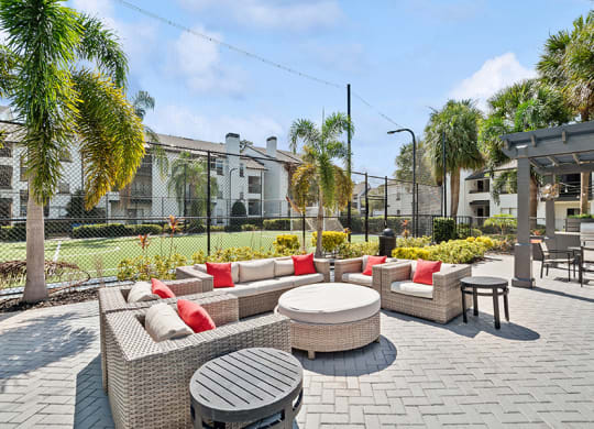 Outdoor Lounge Area with Furniture at Rosehill Preserve Apartments in Orlando, FL.