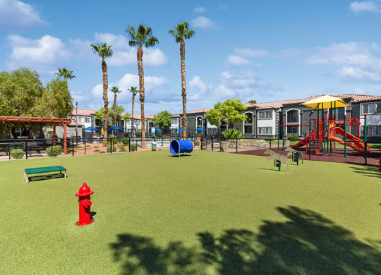 Community Dog Park with Agility Equipment at Loma Vista Apartments in Las Vegas, NV.