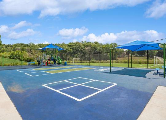 Community Sports Court and Playground Area at Elevate on Parkway Apartments, Minnesota, 55337 