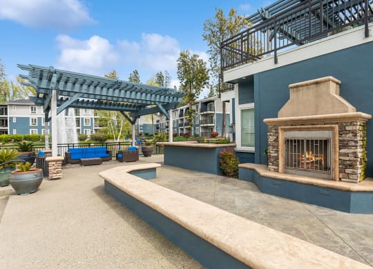 Outdoor Fire Pit Area and Lounge Furniture at Fountains at Point West Apartments in Sacramento, CA.