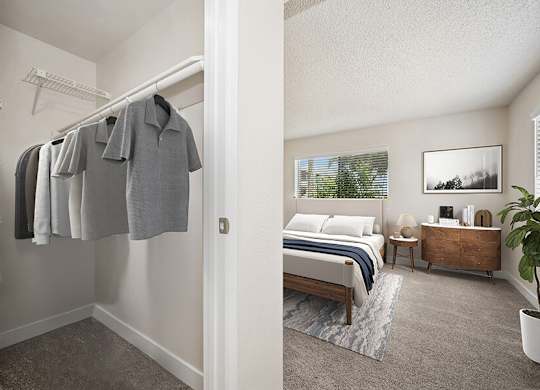 Model Bedroom with Carpet and Large Walk-In Closet at Butler Ridge Apartments located in Glendale, AZ.
