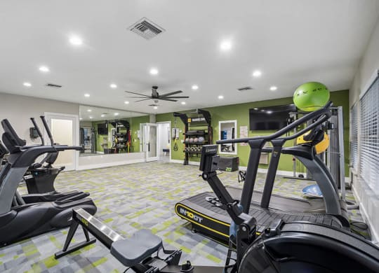 Community Fitness Center with Equipment at Park at 7200 Apartments in Jacksonville, FL.