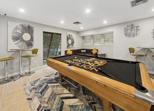 Community Clubhouse Game Tables at Grand Pavilion Apartments in Tampa, FL.