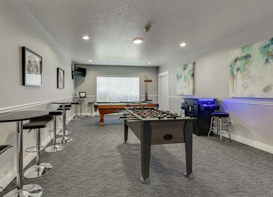 Community Clubhouse with Game Tables at Landings at Morrison Apartments located in Gresham, OR.