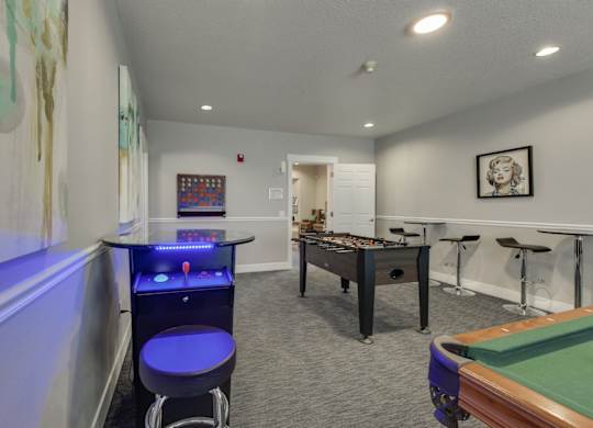 Community Clubhouse with Game Tables at Landings at Morrison Apartments located in Gresham, OR.