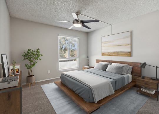 Model Bedroom with Carpet and Window View at Colonnade at Fletcher Hills Apartments in El Cajon, CA.