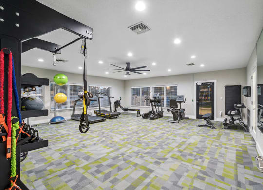 Community Fitness Center with Equipment at Park at 7200 Apartments in Jacksonville, FL.
