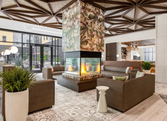 Lobby with couches and a fireplace