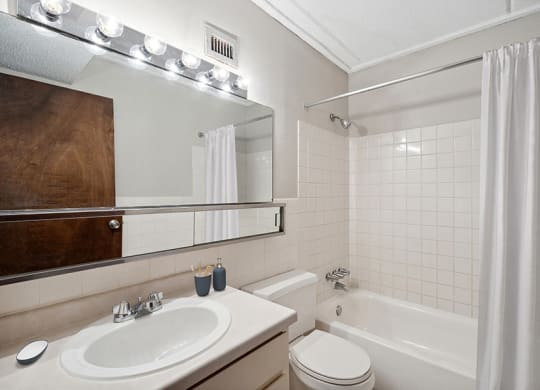 Model Classic Unit Bathroom with Shower/Tub & Wood-Style Flooring at Elevate on Parkway, Burnsville, 55337