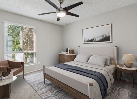 Model Bedroom with Carpet and Window View at Colonnade at Fletcher Hills Apartments in El Cajon, CA.