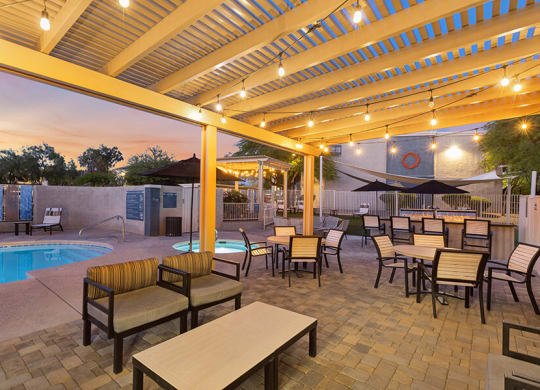 Outdoor Patio Area with Lounge Furniture at Ridgeline Apartments in Tucson, AZ.