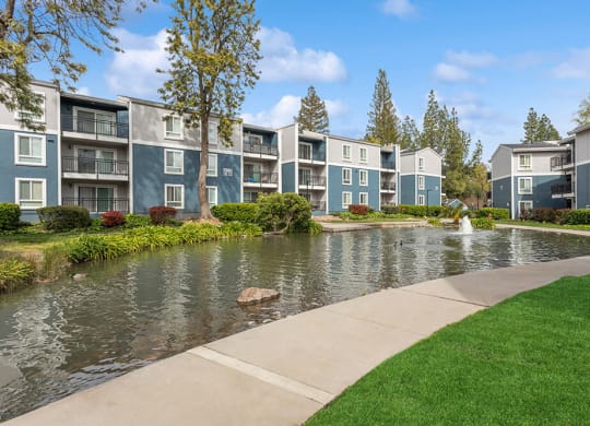 Exterior Community Buildings & Fountain at Fountains at Point West Apartments in Sacramento, CA.