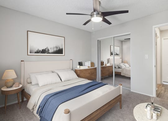 Model Bedroom with Carpet and Closet at Colonnade at Fletcher Hills Apartments in El Cajon, CA.