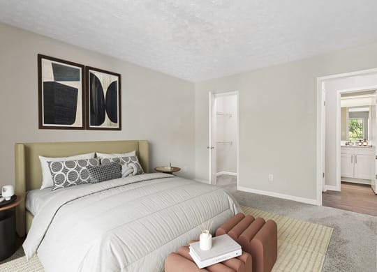 Model Bedroom with Carpet and Walk In Closet at Lakeside Retreat Apartments located in Peachtree Corners, GA.