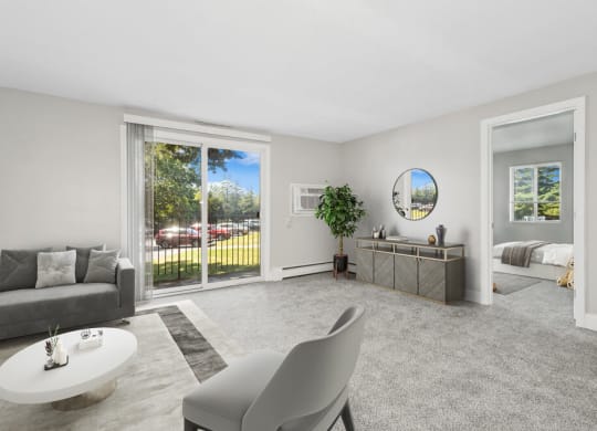 Model living room with a couch and a table