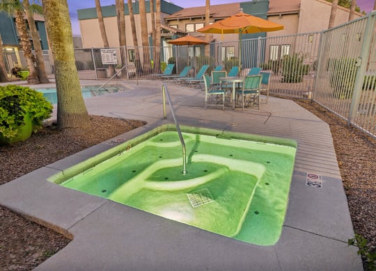 Community Hot Tub and Lounge Furniture at Tanque Verde Apartments located in Tucson, AZ.