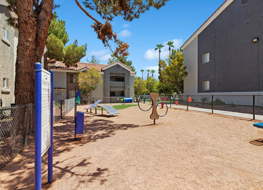 Community Dog Park with Agility Equipment at Verraso Apartments in Las Vegas, NV.