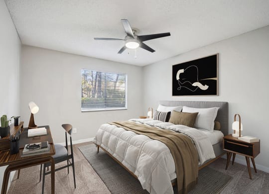 Model Bedroom with Carpet and Window View at Westland Park Apartments in Jacksonville, FL.
