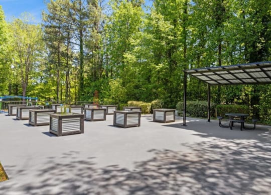 Outdoor Planter Boxes and Canopy Area at Dunwoody Village Apartments in Atlanta, GA.