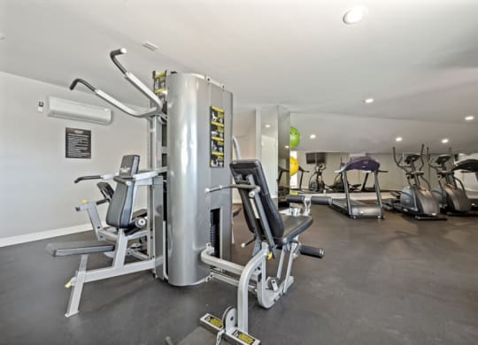 the gym at District at Fiesta Park apartments