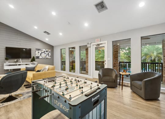 Community Clubhouse Game Tables at Grand Pavilion Apartments in Tampa, FL.