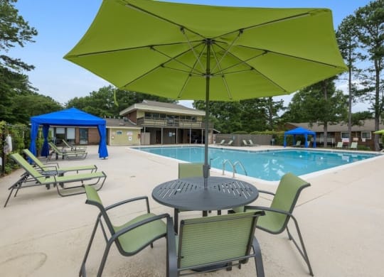 Poolside cabanas and lounge chairs