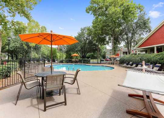Poolside cabanas and lounge chairs