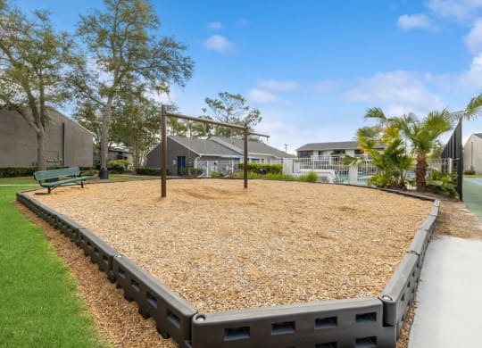 Community swing set with bench
