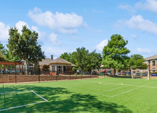 Community Soccer Field with Nets at Belmont at Duck Creek Apartments in Garland, TX.