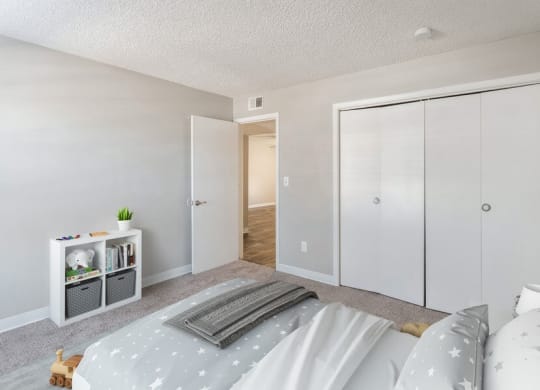 Model Bedroom with Carpet at Indigo Park Apartments in Albuquerque, NM.