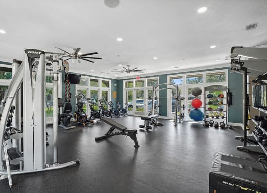 Community Fitness Center with Equipment at Fountains Lee Vista Apartments in Orlando, FL.
