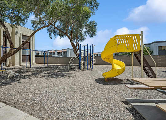 Community Playground and Picnic Tables at Butler Ridge Apartments located in Glendale, AZ.